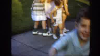 Massachusetts (1949): A Group Of People Women And Men At The Front Of A House And
