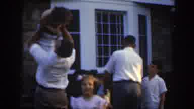 Massachusetts (1949): Children Playing With With Their Parents In An Evening