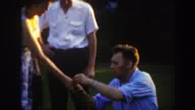 Massachusetts (1949): One Woman And Two Man In A Field With A Man With A Camera