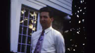 Massachusetts (1949): A Guy With A Tie And A Boy Appears And Looks At The Camera