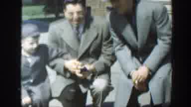 Massachusetts (1949): Two Men Wearing Suits Standing And A Little Kid By Their