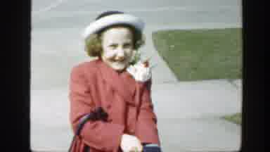 Massachusetts (1949): Child Putting On Glove In A Red Coat