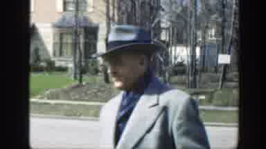 Massachusetts (1949): Girl Wearing Red Coat With White Hat Waves At Camera On A