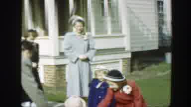 Massachusetts (1949): A Man Plays With The Young Ones While The Women Watch