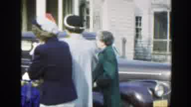 Massachusetts (1949): A Group Of People All Well Dressed And A Funny Girl Wearing
