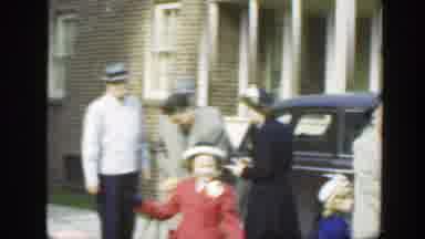 Massachusetts (1949): Men Women And Children Dressed In Coats Stand Next To A Car