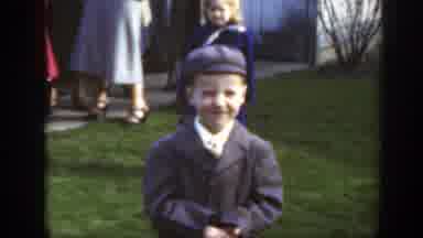 Massachusetts (1949): Smiling Playing Hat Coat Dressed White Boy Running Cute Girl