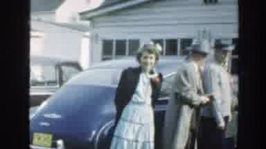 Massachusetts (1949): A Gathering Of People In The Backyard Of Some Houses In A