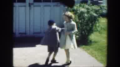 Massachusetts (1949): A Boy And A Girl Holding Hands And Turning Round In A