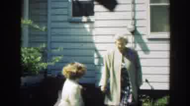 Massachusetts (1949): A Grandmother And Her Granddaughter Taking A Walk As She