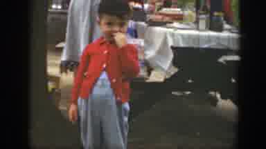 Massachusetts (1949): A Cute Little Boy Looking At The Camera With His Hand Over