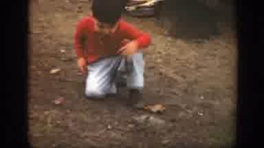 Massachusetts (1949): A Little Funny Kid Stands And He Is Chewing Something