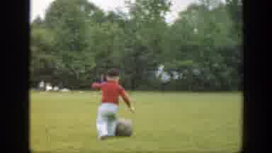 Massachusetts (1949): Little Girl Plays With A Ball In A Large Park With Grass
