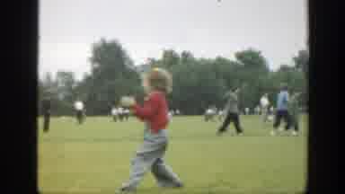 Massachusetts (1949): Parents And Children Playing Sports On A Sunny Day In The