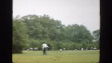 Massachusetts (1949): Family Playing A Ball And Stick Game In The Park On A Windy