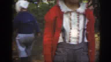 Massachusetts (1949): Girl Wearing Red Sweater Smiles For Camera While Boy Wearing