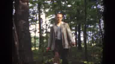 Massachusetts (1949): A Man In An Unbuttoned Suit Walks To Meet With Another Man