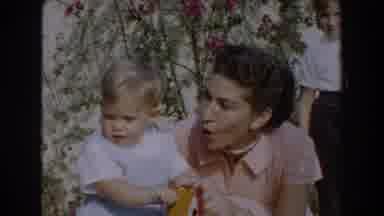 Glendale California (1962): Mother Using A Child On A Wooden Goody Rocking Horse