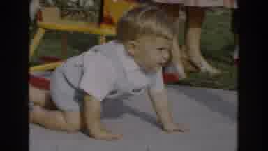 Glendale California (1962): A Baby Left His Mother's Arm To Crawl On The Floor