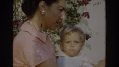 Glendale California (1962): A Baby Being Feed By His Mother At The Backyard Of A