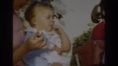 Glendale California (1962): Mother Giving Cake To Baby