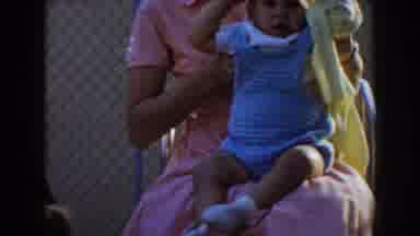 Glendale California (1962): Well Dressed Ladies In Mid-Attire Tend To A Child And