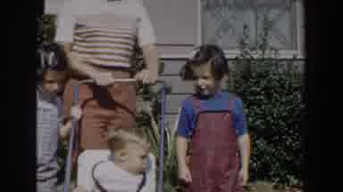 Glendale California (1962): An Adult And Three Children Walking With One Child In