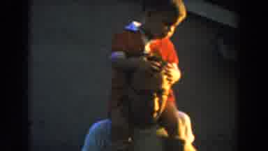 Glendale California (1962): Father Holding His Little Son On His Shoulders While