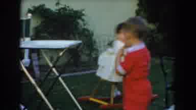 Glendale California (1962): A Baby Boy And Baby Girl Play With Each Other Then Run
