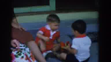 Glendale California (1962): Two Dark Haired White Children Playing With Toys While