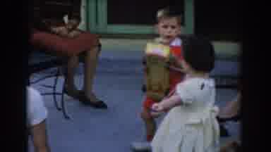 Glendale California (1962): A Blond Little Boy Playing With A Little Girl With