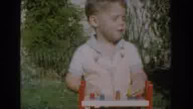 Glendale California (1962): Young Boy Hammering Pegs Into Holes With A Mallet