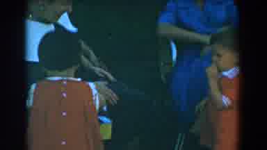 Glendale California (1962): A Mum Corrects Her Son By Holding Him With Both Hands