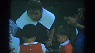 Glendale California (1962): Two Children Dressed In Red Clothing Play At Their