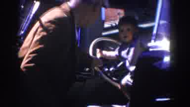 Glendale California (1962): A Little Boy Is Playing In A Car With His Dad