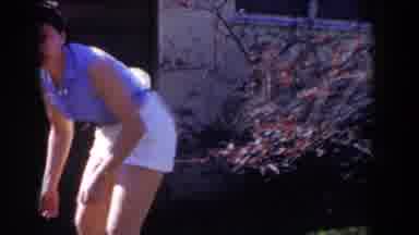 Glendale California (1962): A Woman Playing With Her Baby Outset In The Yard