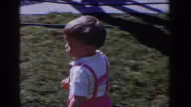 Glendale California (1962): Baby In Pink Overalls At A Family Members Home Playing