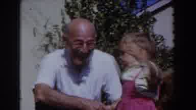Glendale California (1962): Grandpa Plays With His Children And A Dog In A Garden