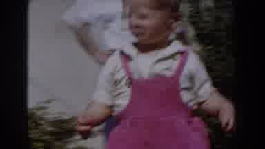 Glendale California (1962): A Baby Runs To Collect An Object From An Adult As