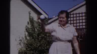 Glendale California (1962): An Elderly Woman Beckon On Someone Staying Behind An