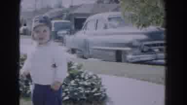 Glendale California (1962): Child Wearing Hat And Jacket Playing Outdoor In Front