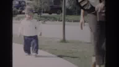 Glendale California (1962): View Of Toddler Wearing White Sweater And Gray Hat
