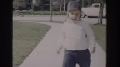 Glendale California (1962): Young Boy Child Walking Towards Camera With Hat And