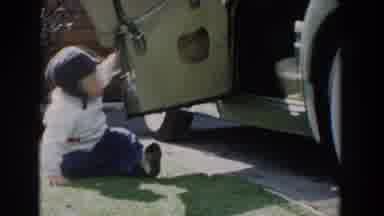 Glendale California (1962): Young Boy Playing Outside Near An Old Car