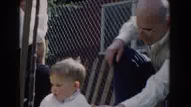 Glendale California (1962): An Elderly Man Looking After A Kid While Another Woman