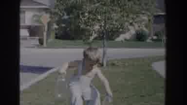 Glendale California (1962): A Young Boy Picks Up Two Glass Jars And Walks With