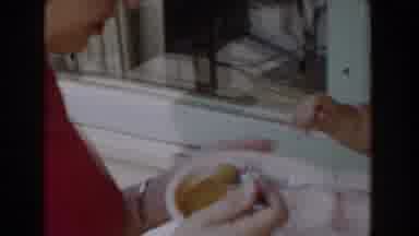 Glendale California (1962): Mother Feeding Her Toddler