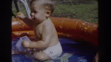 Glendale California (1962): Baby Enjoys In A Children Pool Apparently In The