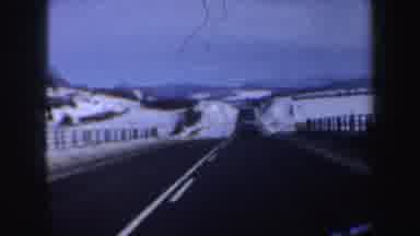 New Hampshire (1962): Vehicle Travels Down Highway Guardrails To Either Side Of