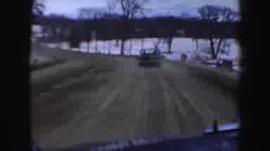 New Hampshire (1962): Approaching View Of Frozen Lake And A Small White House On A